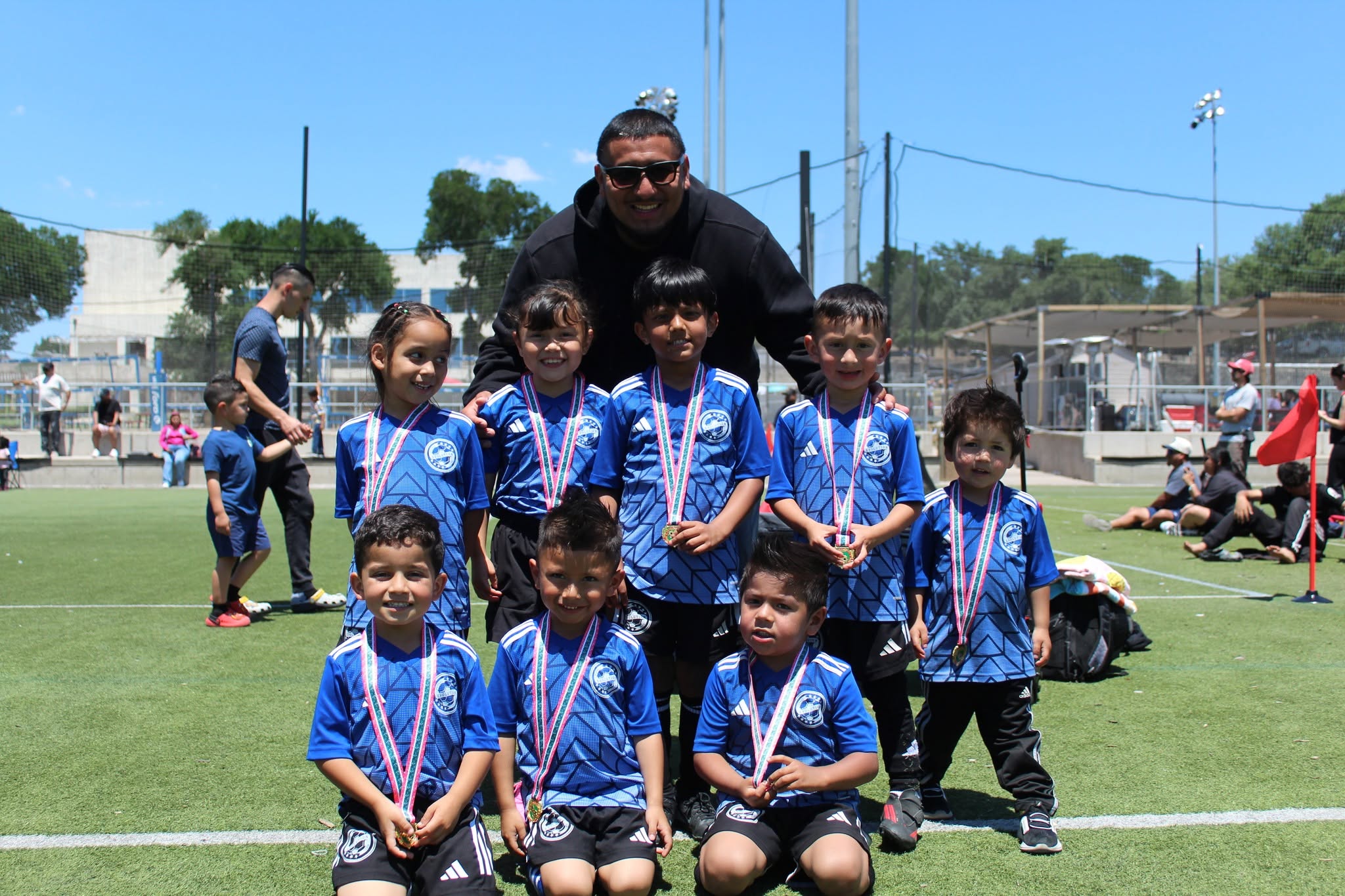 Evolution FC team and coach